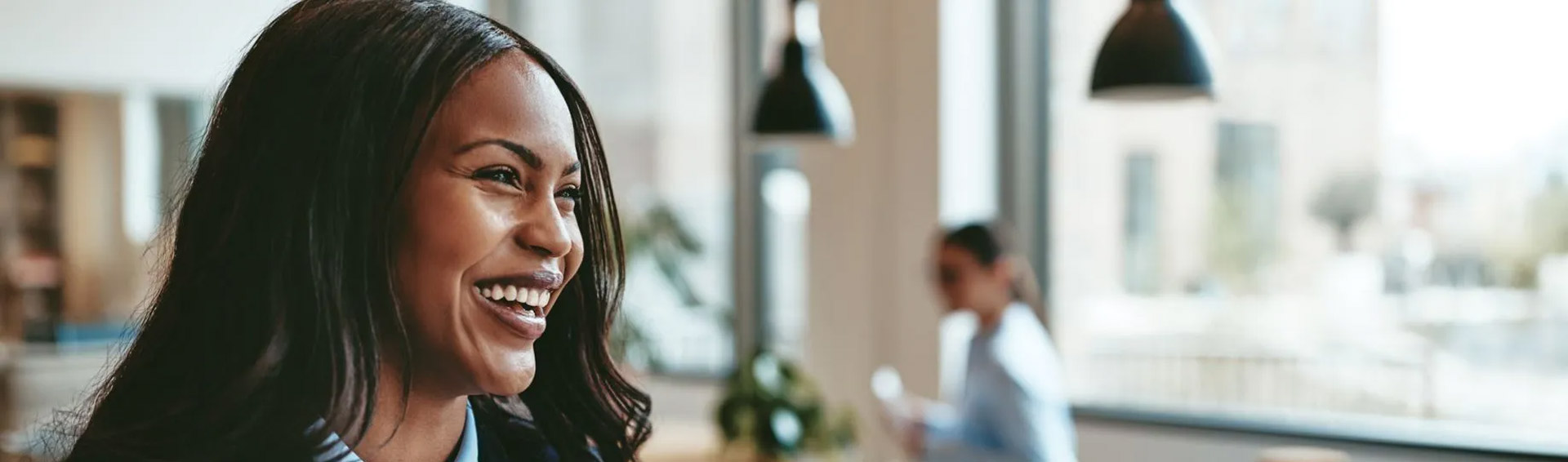 A smiling business person working in an office