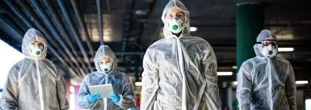 Hazmat workers in protective clothing