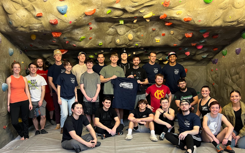 group of students in bouldering cave