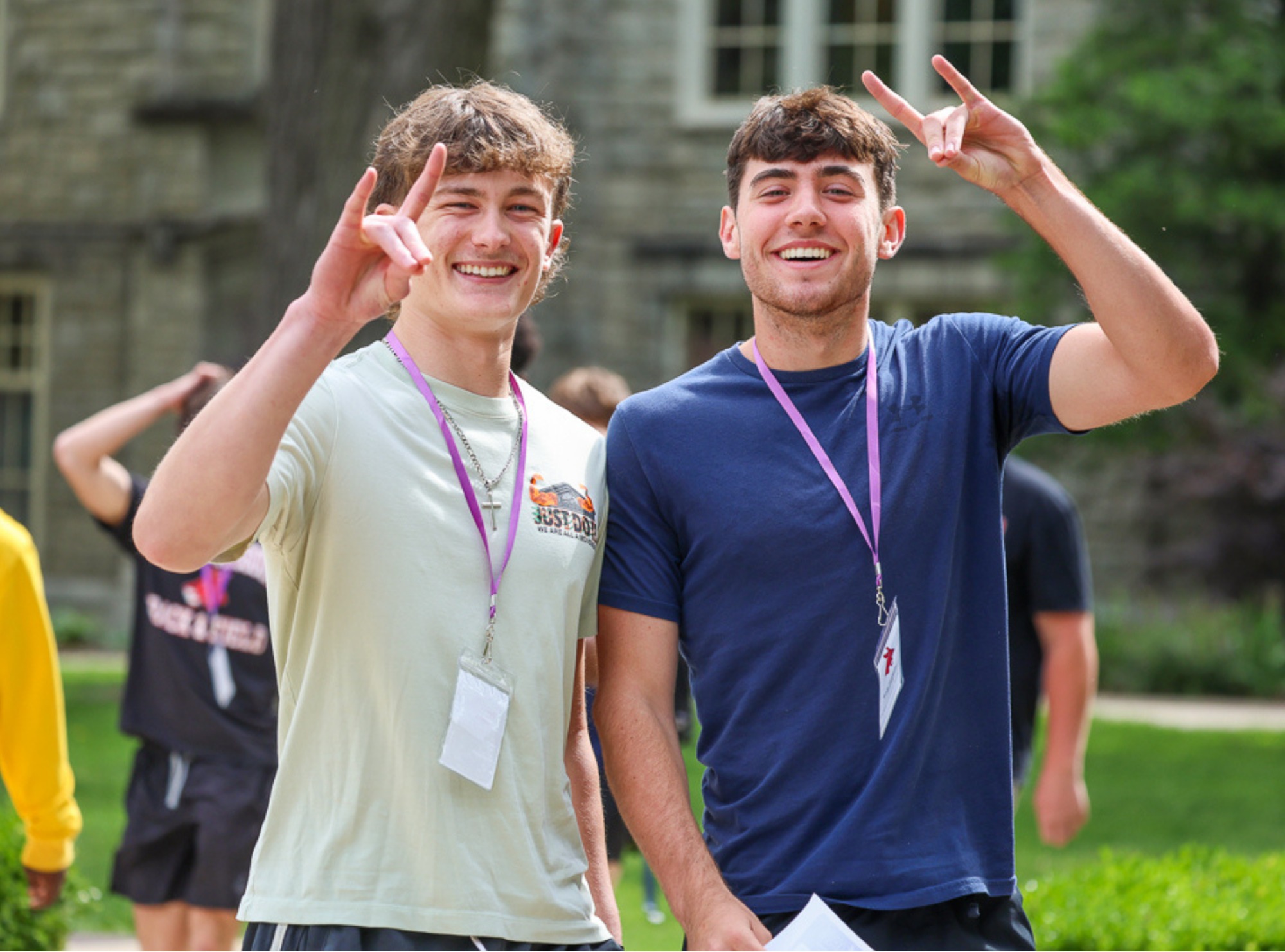spirited-students spirited students giving the "snouts out" hand signal