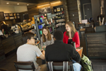 students sitting at a table at Starbucks