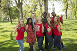 group of UCM students showing "snouts out" hand symbol
