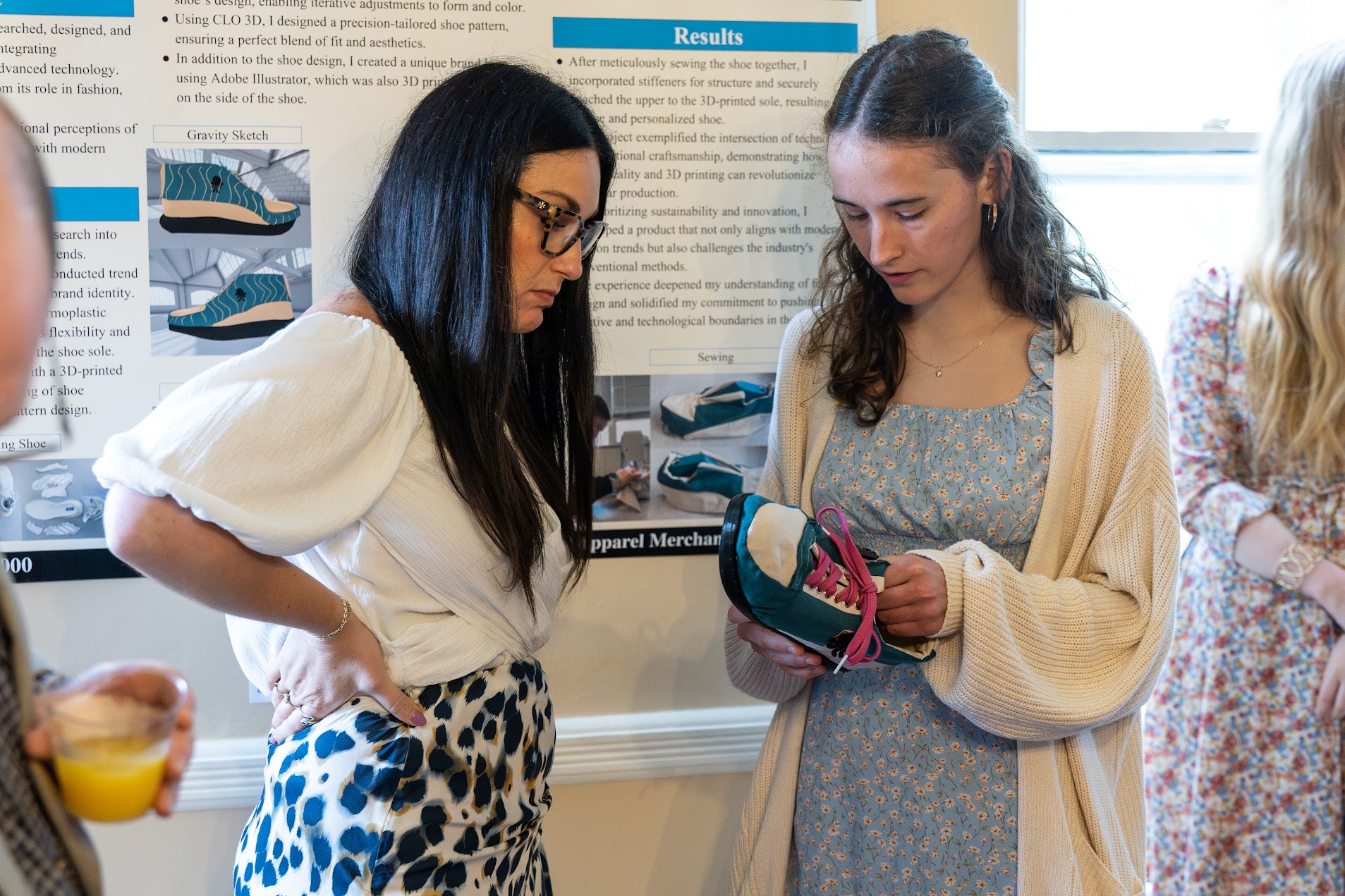 Shoe Honors Project Honors student looking over her Honors Project.